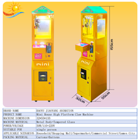 Meilleure vente : Mini machine de jeu de grue jaune, à monnayeur électrique, en métal, distributeur de prix à monnayeur, jouet, Garantie 1 an, Transfrontalier