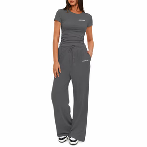 Nouvel ensemble décontracté 2 pièces pour femme : haut plissé à manches courtes et pantalon skinny taille haute, sportswear uni, printemps, écoresponsable - Product Image 2