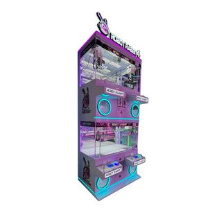 Equipo de entretenimiento Máquina de garra de premio que funciona con monedas Juguete 4 jugadores Máquina de garra Mini juguete Grúa Juego Máquina Expendedora de premios - Product Image 1