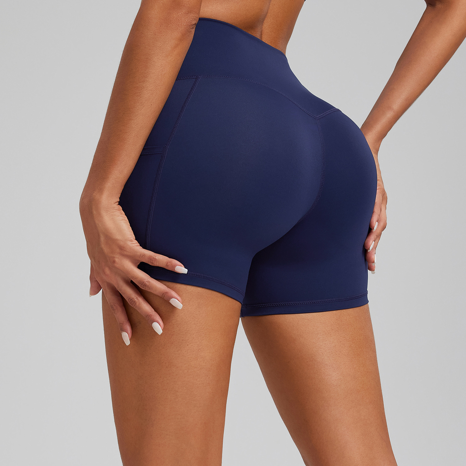 Women's High-Waisted Butt-Lifting Yoga Shorts Pockets Tummy Control Wrinkle-Resistant Solid Pattern Spandex/Nylon Material