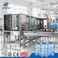 Machine de remplissage 300 BPH 5 gallons haute vitesse intégrée avec lavage, remplissage et bouchage pour petites et moyennes usines d'eau potable