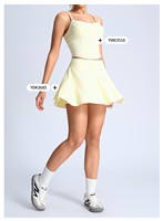Ensemble de yoga et de sport pour femme : Débardeur color-block avec coussinets et jupe taille haute à taille élastique, séchage rapide