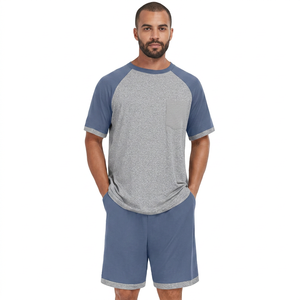 Conjunto de camiseta y pantalones cortos de verano para hombre, talla grande, informal, con bloques de color, de punto, poliéster y algodón, dos piezas. - Product Image 1