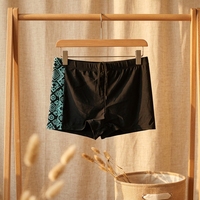 Short de bain décontracté pour homme, taille élastique, avec empiècement latéral contrastant et logo imprimé sur le devant, vente en gros (1 pièce)