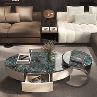 Table basse moderne - Cadre en acier inoxydable de forme ovale avec rangement caché pour salon, hôtel, bureau