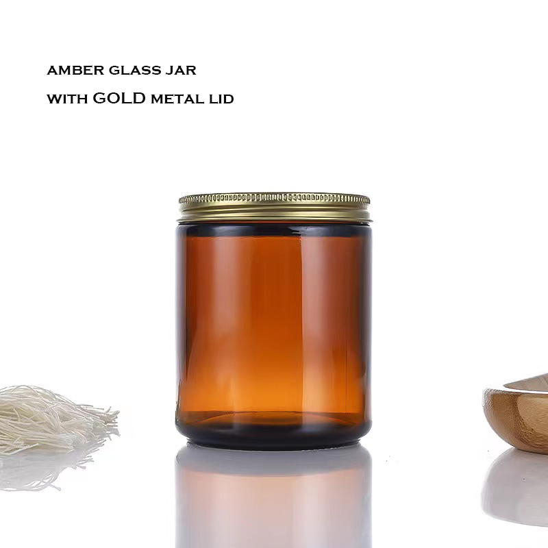 Barattolo ambrato con coperchio in alluminio dorato