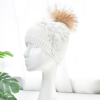 Femme véritable fourrure pompon bonnet chapeaux pour femmes hiver laine tricoté Logo personnalisé bonnet chapeau haute qualité bonnet chapeau pour femmes hiver
