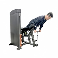 Appareil de musculation à charges guidées pour soulevé de hanche, soulevé de fessiers, et soulevé de fessiers couché sur le ventre