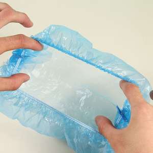 <span class=keywords><strong>Grand</strong></span> bonnet de <span class=keywords><strong>bain</strong></span> en plastique PE imperméable à l'eau Couvre-tête en plastique PE Transparent cheveux jetables Bonnets de douche - Product Image 1