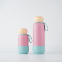 Bouteille isotherme en acier inoxydable de 18 oz avec couvercle rond en forme de champignon, anti-fuite, mignonne, pour boissons chaudes/froides, avec poignée et tapis en silicone