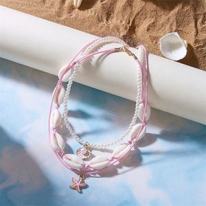 Ensemble de colliers bohèmes tendance en forme d'étoile de mer pour l'été, un ensemble polyvalent de 3 colliers en coquillages, étoiles de mer et perles - Product Image 3