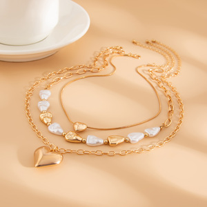 Collana con Ciondolo a Cuore in Metallo Dorato e Argentato alla Moda, Design Stratificato Irregolare Simile a Perle per Donne - Product Image 4