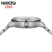 NIBOSI 2627 Reloj clásico de cuarzo para hombre, caja Sunburst, correa de acero, resistente al agua, reloj elegante de negocios para hombre
