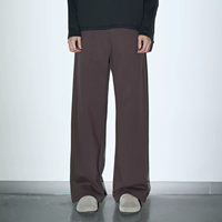 Pantalon de survêtement ample à cordon de serrage avec logo personnalisé imprimé en feuille d'or, coupe large et panneau à la couture du genou, vente en gros