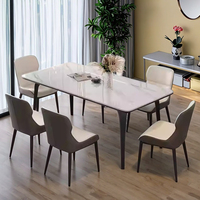 Ensemble de table à manger en marbre métallique 8 places avec chaises, design moderne et luxueux, forme rectangulaire, ton mat chaud, meubles pour la maison