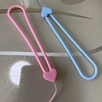 Cordon de téléphone portable en silicone en forme de cœur, personnalisable en usine, écologique, durable, cadeau promotionnel pas cher, sangle anti-perte pour poignet