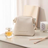 Nouvelle pochette cosmétique de luxe en cuir PU imperméable de marque personnalisée pour femmes de marque mini trousse de maquillage de voyage