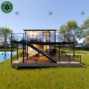 Moderna casa modular prefabricada de dos pisos en acero ligero, tipo resort villa, con balcón con barandilla de vidrio y terraza exterior. - Product Image 6