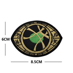 Toppe ricamate con fior Morale legate al gioco di Breakout della zona scura oro nero fascia internazionale con bracciolo bianco lupo squadrone - Product Image 5