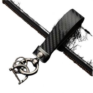 Wholesale <b>Custom</b> Luxury Retro Premium Leather <b>Keychain</b> with Premium Logo Alloy Metal Car <b>Keychain</b> for Gifts Carton Pattern Style - Product Image 1