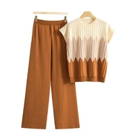 Ensemble coordonné en tricot pour femme, style luxe discret, pull sans manches côtelé et pantalon palazzo, collection boutique été