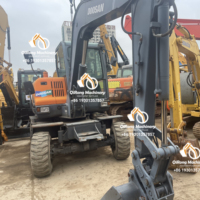 Excavatrice sur pneus DOOSAN DX60W-9C d'occasion avec une résistance éprouvée, achat rentable