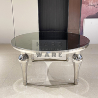 Chaises de salle à manger et tables de mariage de luxe avec pieds coniques en miroir argenté et plateau en verre trempé pour événements extérieurs d'hôtel