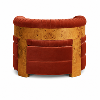 Fauteuil en velours orange brûlé avec accents en bois de burl et capitonnage cannelé pour salon