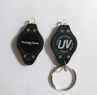 Lampe de poche UV Offre Spéciale porte-clés 365nm-395nm lampe torche LED noire porte-clés lampe de poche porte-clés personnalisé lampe de poche