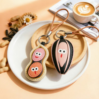 Porte-clés en cuir PU motif cacahuète de dessin animé, graines de tournesol, graines de melon, avec cordon en cuir, cadeau d'anniversaire pour femme