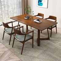 Table à manger rectangulaire en bois de style nordique luxueux avec chaise à accoudoirs Hiroshima, idéale pour plusieurs personnes