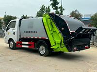 Camion à ordures compacteur Dongfeng 5CBM Diesel 4x2 à transmission manuelle avec moteur et boîte de vitesses, norme d'émission Euro 3
