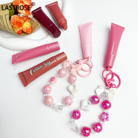 Porte-clés végétalien brillant à lèvres plus dodu huile claire marque privée huile pour les lèvres hydratante avec saveurs de fruits forme liquide