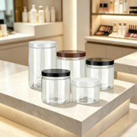 Pot en plastique PET transparent de qualité alimentaire avec couvercle noir pour beurre corporel, bonbons, gommage corporel, crème de soin de la peau