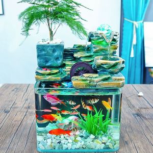 Offrant de grands aquariums avec plantes aquatiques, des rochers artificiels, de l'eau courante, des roues à eau Feng Shui et des poissons décoratifs - Product Image 5
