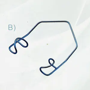 Disposable eye wire speculum with open blades