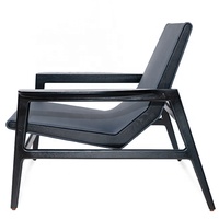 Fauteuil de salon au design nordique minimaliste contemporain avec revêtement en cuir PU et mousse à mémoire de forme pour appartement/villa/hôtel