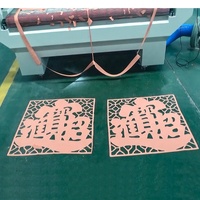 Mesin Pemotong Laser Tekstil Kain Pemberi Makan 1610 CO2 Otomatis untuk Pemotong Kain Gulungan