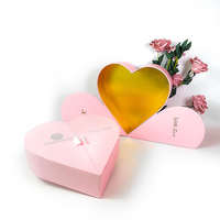 Emballage de luxe biodégradable Ensembles de soins de la peau Boîte en papier rigide rigide en carton Boîtes d'emballage à double porte de couleur rose
