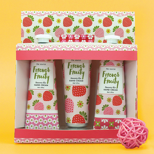 Set de Regalo de Tres Cremas de Manos con Aroma a Fresa y Naranja en Caja de Regalo de Papel con Impresión Colorida - Product Image 1