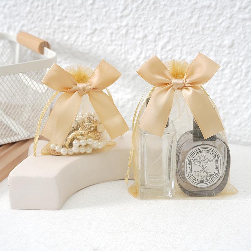 Sac en organza doré-17x23cm-noeud papillon