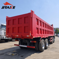 Camion benne Sinotruk HOWO TX 8x4 de 50 tonnes à forte capacité de montée, 12 roues, pour usage sur routes en pente, à vendre en RDC