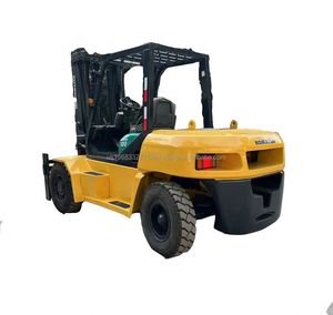 Montacargas Diésel Komatsu FD100 Usado, Capacidad de 10 Toneladas, Neumáticos Sólidos, Altura de Horquilla de 3 m, Mástil de Tres Etapas, Todoterreno, Excelente Rendimiento - Product Image 1
