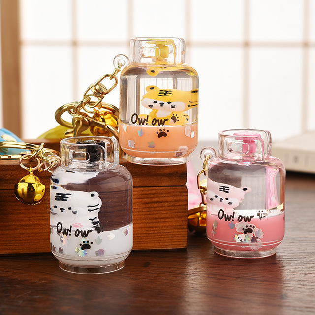 Creative Cute Gas Tank Little Tiger Liquid Keychain for Girl Gift Cartoon Floating Tiger Footprint Sequins Oild Doll Bag Keyring