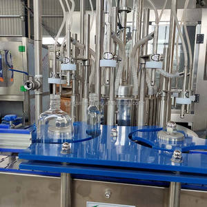 Máquina automática de lavado y llenado de botellas de vidrio con cubierta de aluminio a pequeña escala - Product Image 5