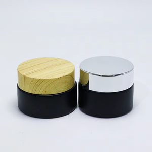 Venta al por mayor de tarros de crema facial cosmética negros mate de 5/10/15/20/30/50 g, envases de vidrio de 1, 2 y 4 onzas con tapas de plástico con efecto madera personalizables - Product Image 3