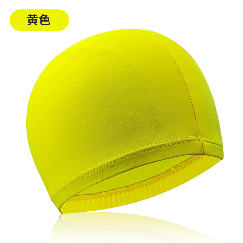 Amarillo, muy elástico y cómodo, no impermeable.