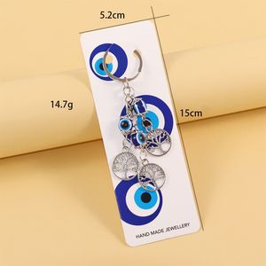 Nuovo Portachiavi con Piccolo Ciondolo a Forma di Palma, Elefante, Tacchino con Occhi Blu per Borsa e Auto - Product Image 6