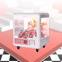 2025 Usine Directe Mini Poupée Machine À Monnaie Multi-Fonction Boîte Magique Griffe Clip Jouet et Bonbons Cadeau Griffe Machine