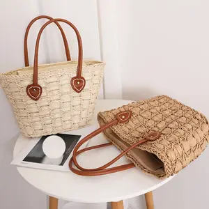 Kadınlar için kadın moda el çantaları lüks omuz plaj çantaları özel tasarım el yapımı kağıt saman dokuma çanta